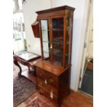 A George III design inlaid mahogany display cabinet of narrow proportion, the glazed upper section