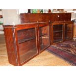 A pair of Victorian mahogany glazed two door wall cabinets, W 89 cms