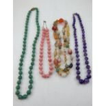 A quantity of various beaded gemstone necklaces, to include amethyst etc.