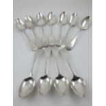 Eleven Georgian Irish silver rat tail and fiddle pattern dessert spoons, Dublin 1822 by James