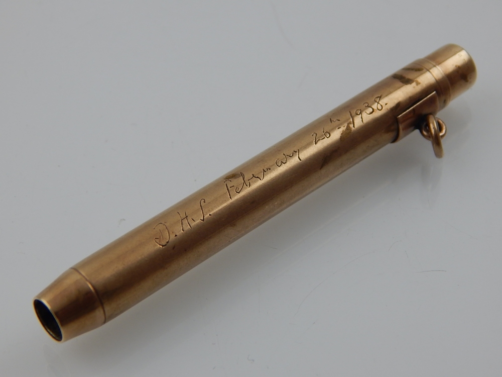 A Bakers perm-point 9ct gold propelling pencil, marks for 1937, with engraved inscription,