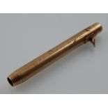 A Bakers perm-point 9ct gold propelling pencil, marks for 1937, with engraved inscription,