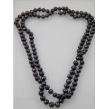 An opera length of black South Sea pearls