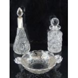 A clear glass scallop handled bowl, with silvered foliate design, together with a silver topped