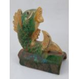 A late 19th century terracotta study of a green glazed fish, H.