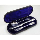 A Victorian silver three piece fiddle pattern Christening set, Sheffield 1851, cased.