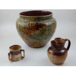 An early 20th century Doulton Lambeth Fern pattern earthenware jardiniere,