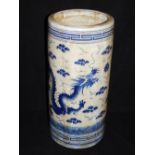 A Chinese blue and white cylindrical porcelain walking stick / umbrella stand,