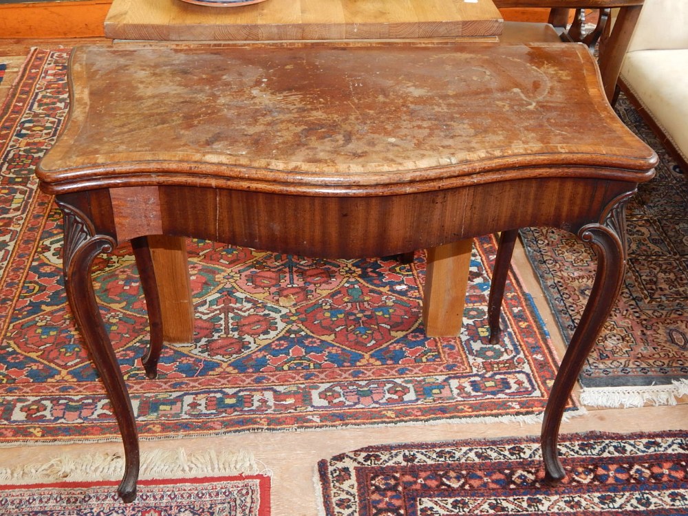 A George III mahogany card table,