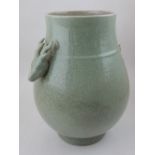 A Chinese crackle glaze celadon vase, of baluster form, having twin deer head handles. H.