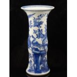 A late 17th/early 18th century Chinese kangxi period blue and white gu shaped vase decorated with a
