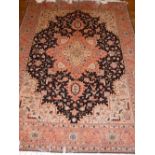 WITHDRAWN - A fine Persian tabriz rug, with unusual Heriz design,