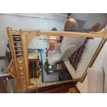 A late Victorian Aesthetic Movement giltwood and gesso overmantle mirror,