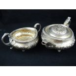 A George IV silver teapot and sugar bowl, possibly J Berenger London 1824,