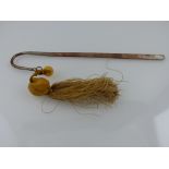 A Chinese hair pin, of typical form, with a carved hardstone rabbit suspended from a silk cord, L.