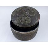 A Japanese metalware circular jewellery box, decorated with dragons, birds and flowering trees, D.