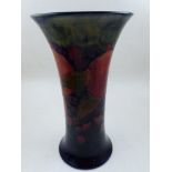 A Moorcroft pomegranate vase, trumpet shaped, the base with signature and impressed mark, H. 27cm.