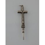 A white metal retractable pencil by Samson Mordan & Co., modelled in the form of a cross.