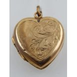 A 9 carat yellow gold heart locket pendant, stamped 9.