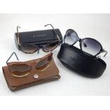 A pair of Burberry sunglasses,