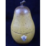 A pear shaped tea caddy, with original key. H. 19cm