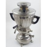 A 20th century silver plated samovar, with bakelite fittings, bears factory mark to cover, H.