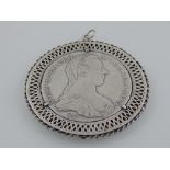 A Maria Theresa Silver Thaler Restrike Trade Coin, mounted in a silver mount.