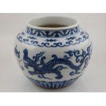 A Chinese blue and white porcelain bowl, decorated with dragons chasing pearl,