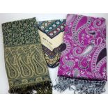 Two cashmere scarves with paisley motifs, together with one vintage Daniel La Foret silk scarf.