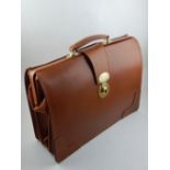 **WITHDRAWN**A Whitehouse Cox bridle leather briefcase.