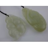 A Chinese jade pendant, carved as a dragon, H.