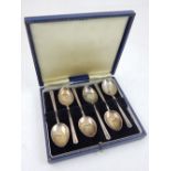 A boxed set of six silver spoons, Birmingham 1966, together with a collection of thirteen glasses.