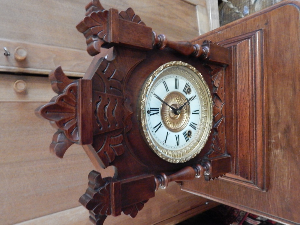 An early 20th century German mantel clock, the white chapter ring set out with Roman numerals, H.