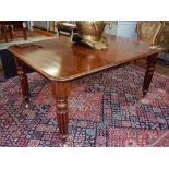 A Victorian mahogany extending dining table,