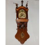 A 20th century Dutch 'Zaanse' clock, the painted dial with Roman numerals,