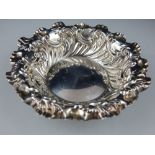 A Victorian silver pin dish, Sheffield 1895, with C-scroll decoration. D. 8cm