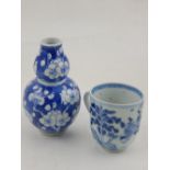 Two Chinese Qing period porcelain items, including a 19th century small double gourd vase,