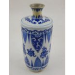 A Chinese Kangxi period blue and white vase, decorated with symbols and pendent bands, H. 17cm.