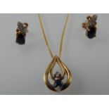 A 9ct gold, diamond and sapphire pendant, on 9ct gold chain, together with 9ct gold, diamond and