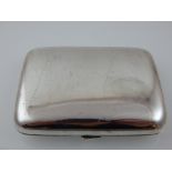 A silver cigarette case, William Sparrow, Birmingham 1920, of polished rectangular form, 3ozt.