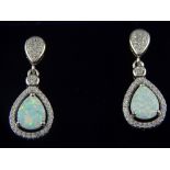 A pair of silver, opalite, and cubic zirconia drop earrings.