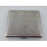 A square silver cigarette case, A.E.