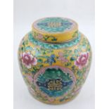 A Chinese yellow ground ginger jar and cover, polychrome decorated with vignettes of Chinese symbols