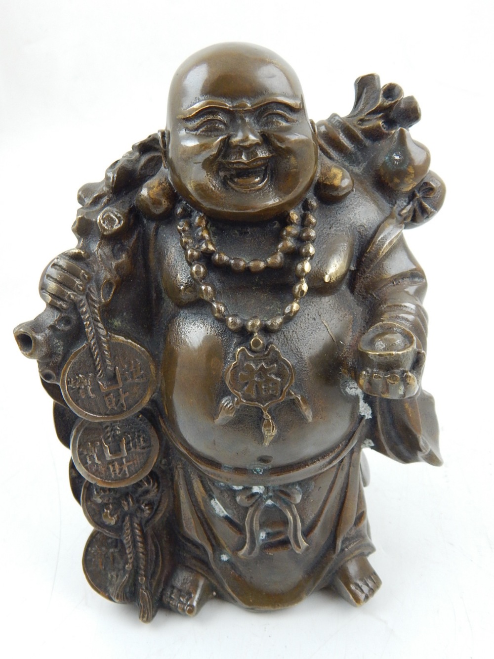 A Chinese cast bronze study of the Laughing Buddha. H. 17cm