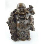 A Chinese cast bronze study of the Laughing Buddha. H. 17cm