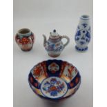 A Chinese Imari bowl and vase, together with a blue and white porcelain vase, marked with four