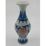A Chinese blue and white tapered baluster vase.
