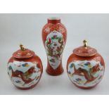 A pair of Chinese porcelain ginger jars and covers, decorated with vignettes of phoenixes and
