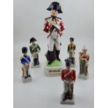 Six continental porcelain models of European cavalry officers, largest a flask. H. 33cm