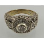 An 18 carat white gold and diamond ring, set central round cut diamond of approx. 0.33 carats, the